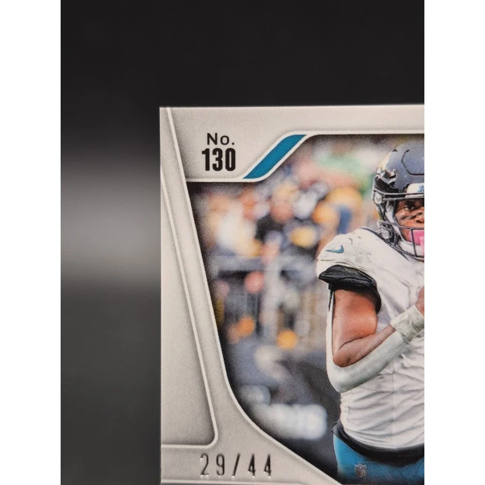2024 Panini Prizm Travis Etienne Jr. #130 Red & Yellow Prizm /44 Jaguars